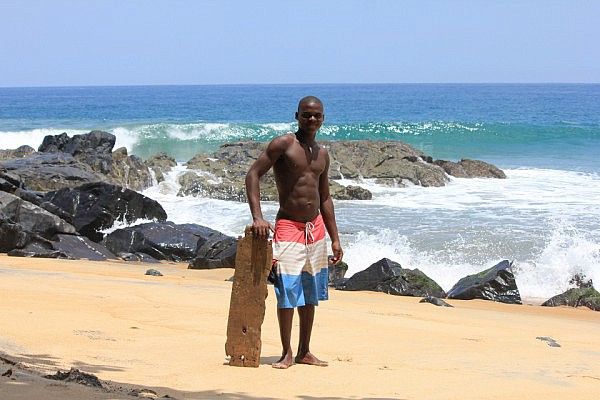 Morris with his wooden boogie board